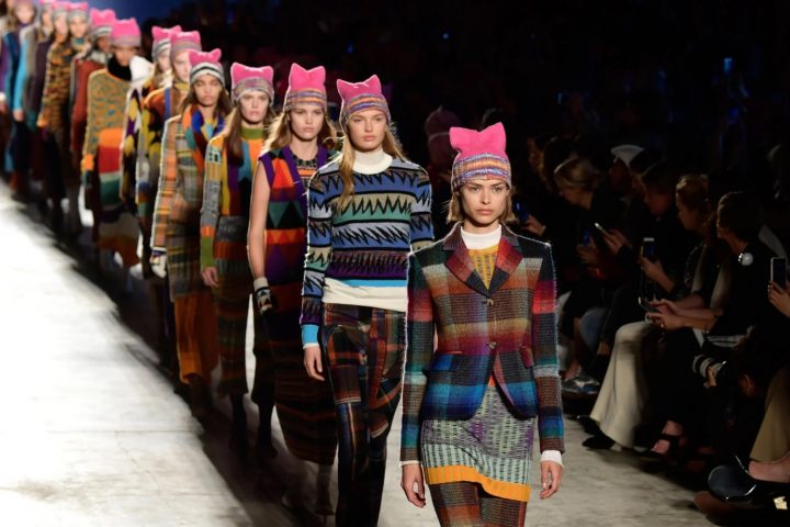 A group of people wearing clothing Description automatically generated with medium confidence